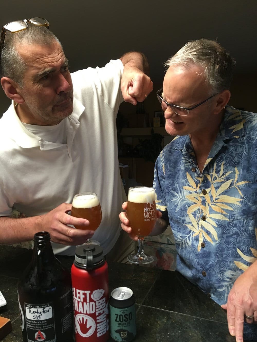 Paul and Norm drinking beer, Paul punching Norm in the face