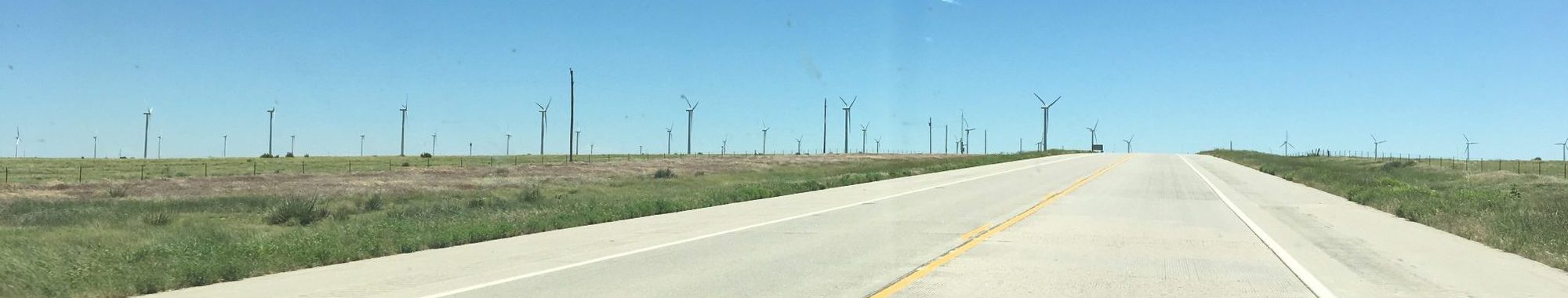 Windmills just off a two lane highway