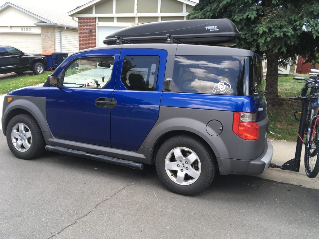 Honda Element with bike rack on back and roof rack on top